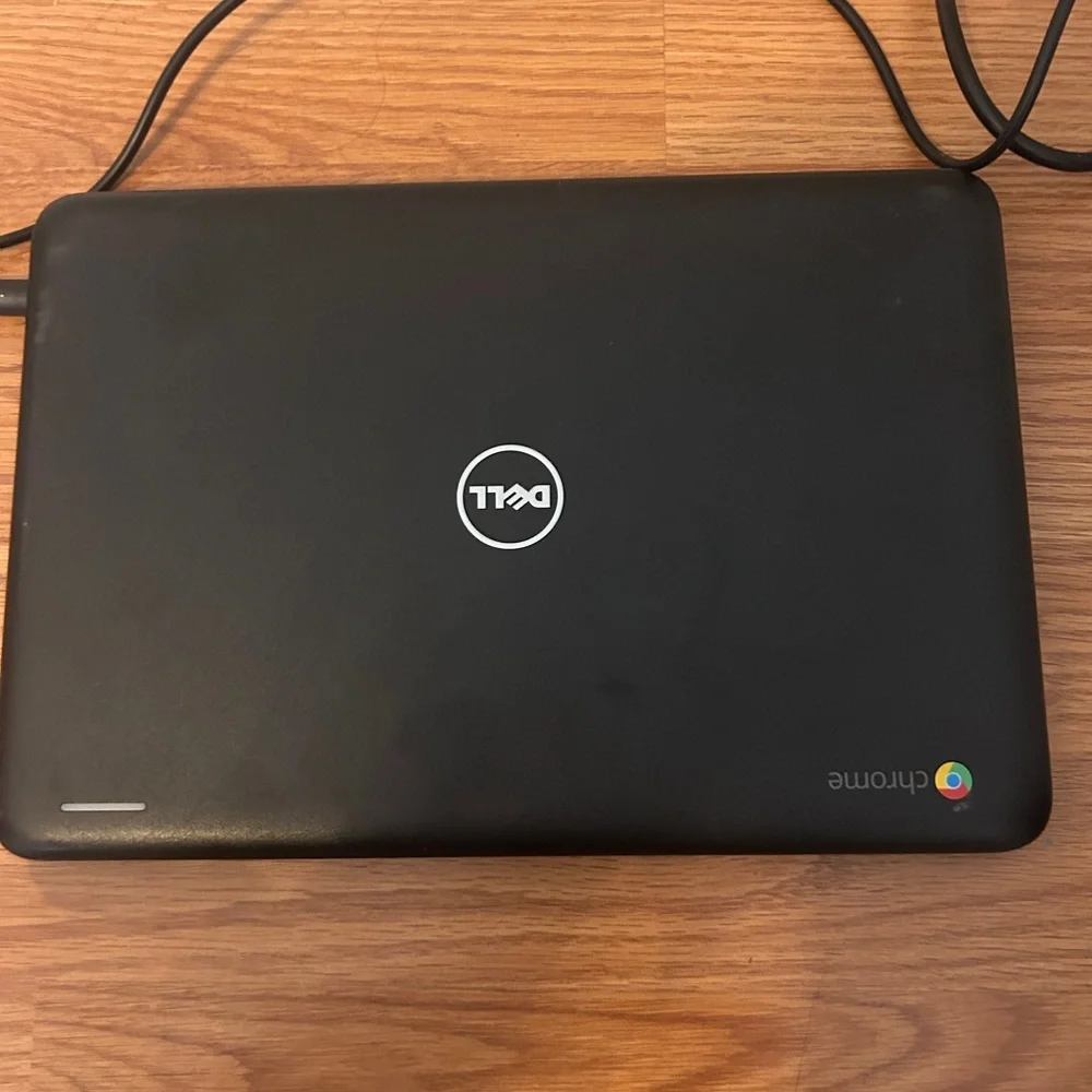 Dell Black Laptop with Matte Finish and Ventilation w/ charger